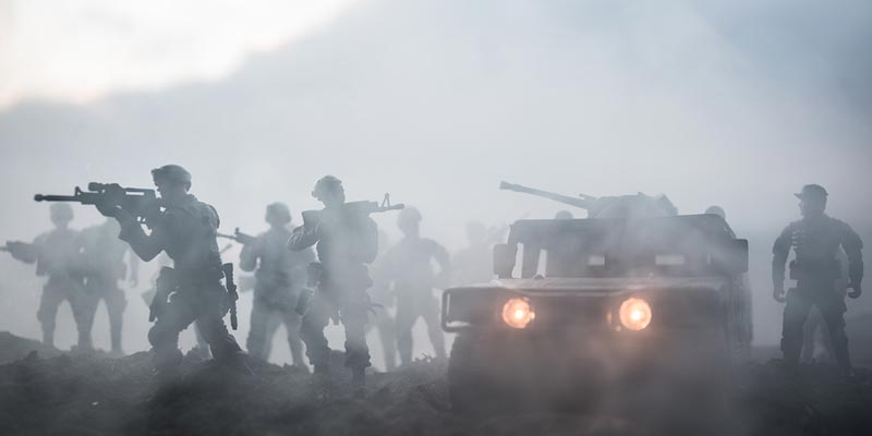 Soldiers and vehicle in a fog