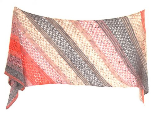 Knitted shawl in cream, pink, and grey stripes.